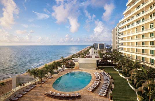 Отель 'The Ritz-Carlton Fort Lauderdale' (Ритц Карлтон Форт-Лодердейл) 5*+, штат Флорида, США. Внешний вид отеля, пляж и океан.
